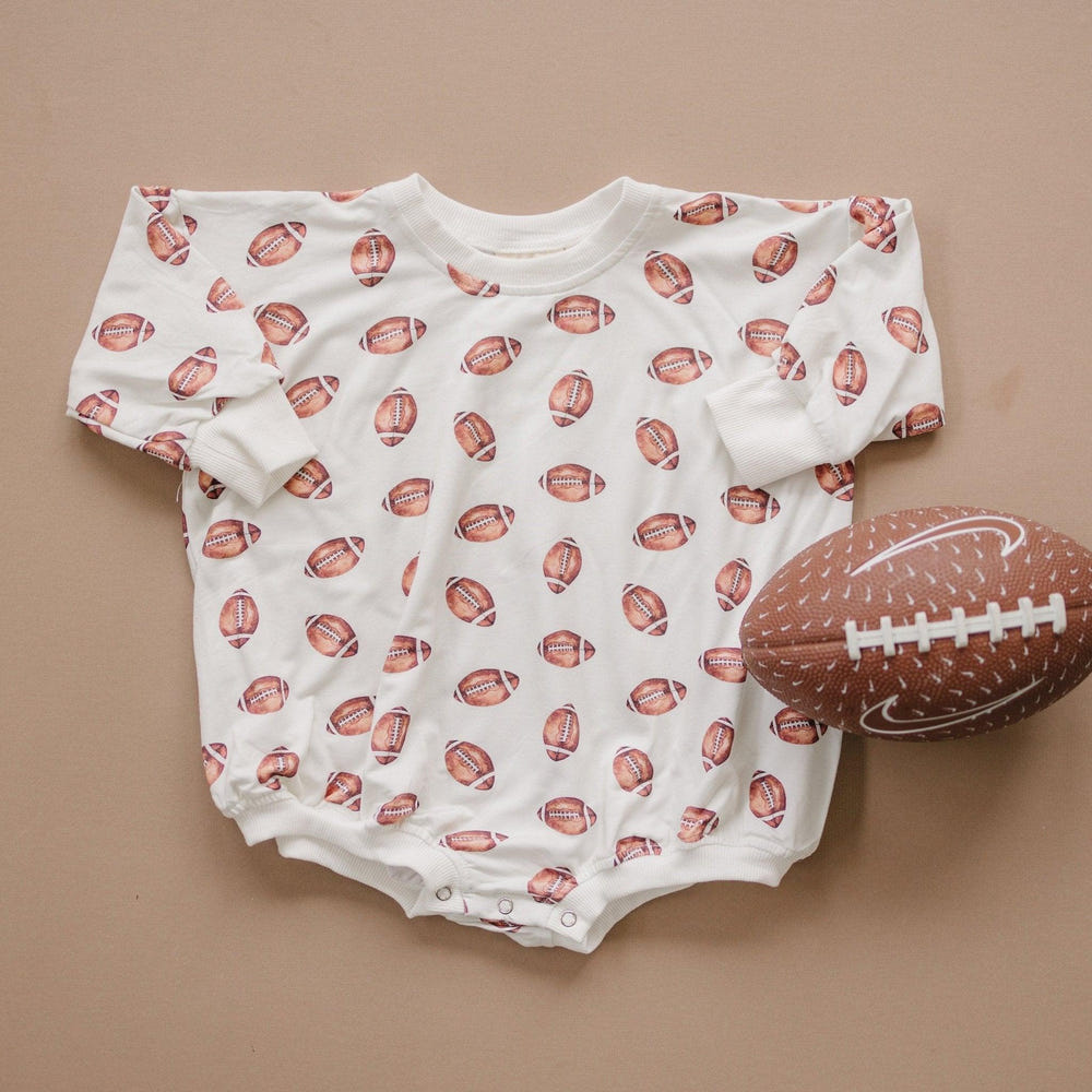 Football print bamboo bubble romper for babies, perfect for playful and stylish outfits.