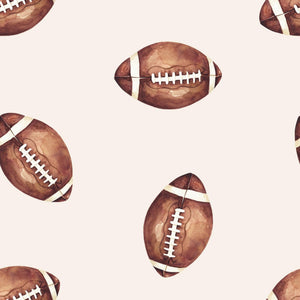 Football print quilted bamboo blanket for babies, 1.0 Tog, perfect for swaddling and cozy comfort.