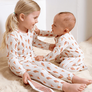 Baby footie zippered one piece in Sundae Fun Day design, showcasing playful colors and cozy fit. Angle 3 view.