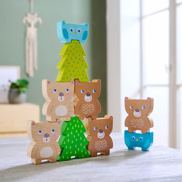 Colorful Forest Friends Stacking Toy for babies, showcasing playful animal designs from an angled perspective.