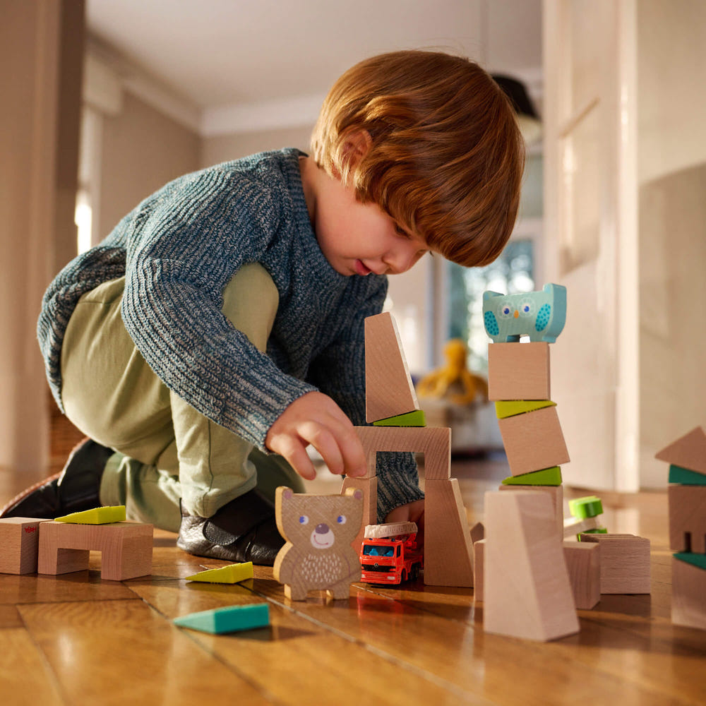 Forest Friends Stacking Toy for babies, featuring colorful animal shapes for fun stacking and sorting play.