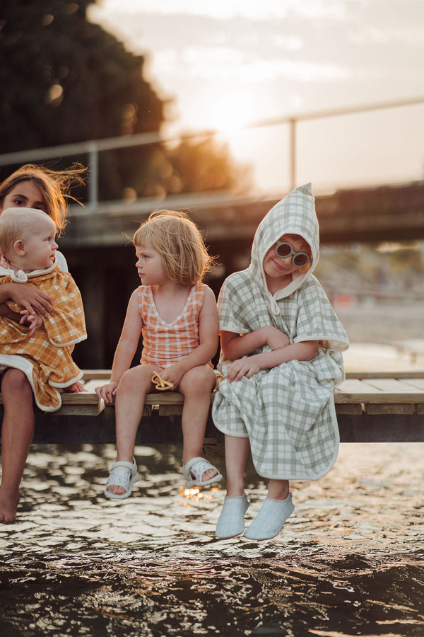 Organic cotton bathing towel poncho in fern plaid, perfect for babies after bath time. Angle 7 view.