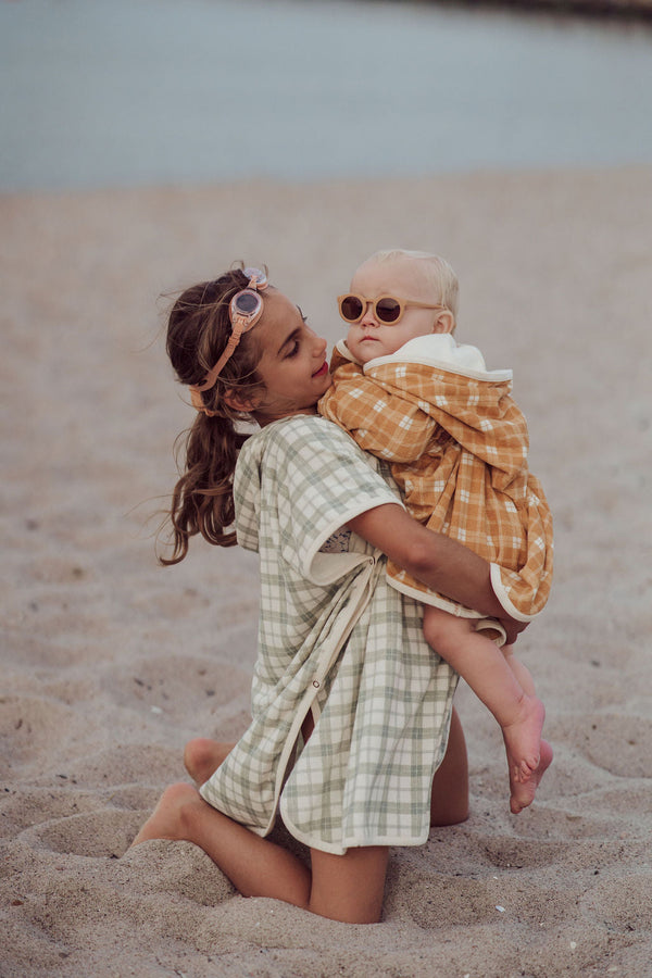 Organic cotton bathing towel poncho in fern plaid, perfect for babies after bath time. Angle 5 view.
