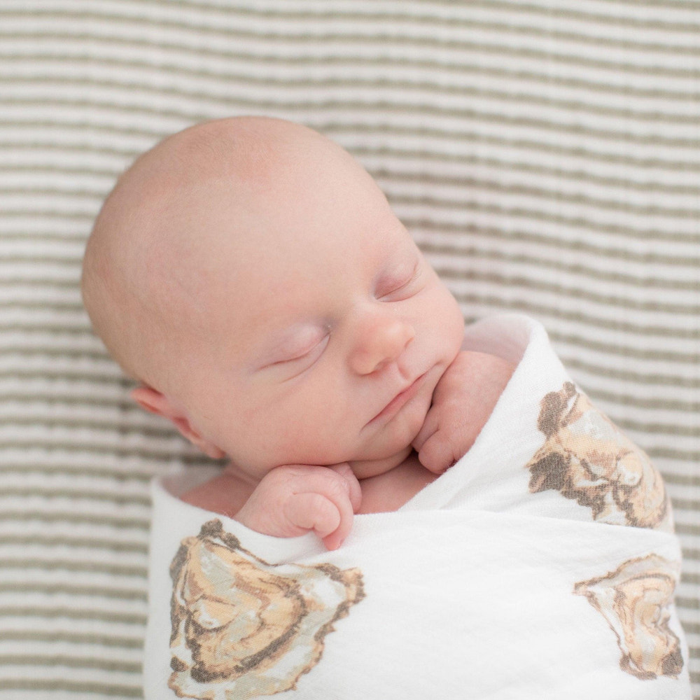 Aw Shucks! Oyster baby swaddle blanket and burp cloth/bib gift set for newborns. Soft, stylish, and practical.