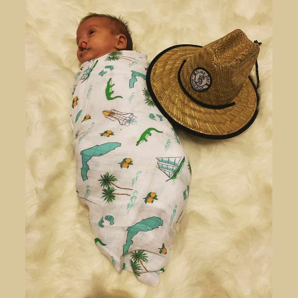 Florida Baby Muslin Swaddle Blanket and Burp Cloth/Bib Combo gift set for infants, perfect for cozy and stylish baby care.