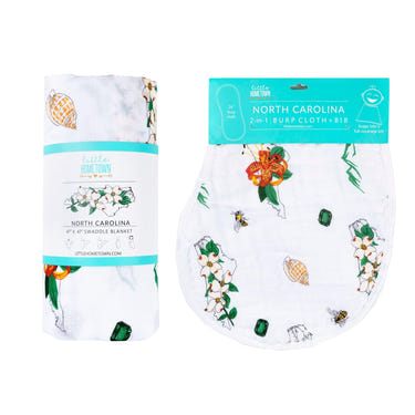 North Carolina baby muslin swaddle blanket and floral burp cloth/bib combo gift set. Perfect for newborns.