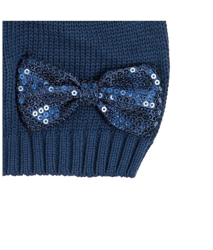 Navy knit beanie for girls with a cute bowtie detail, perfect for stylish warmth.
