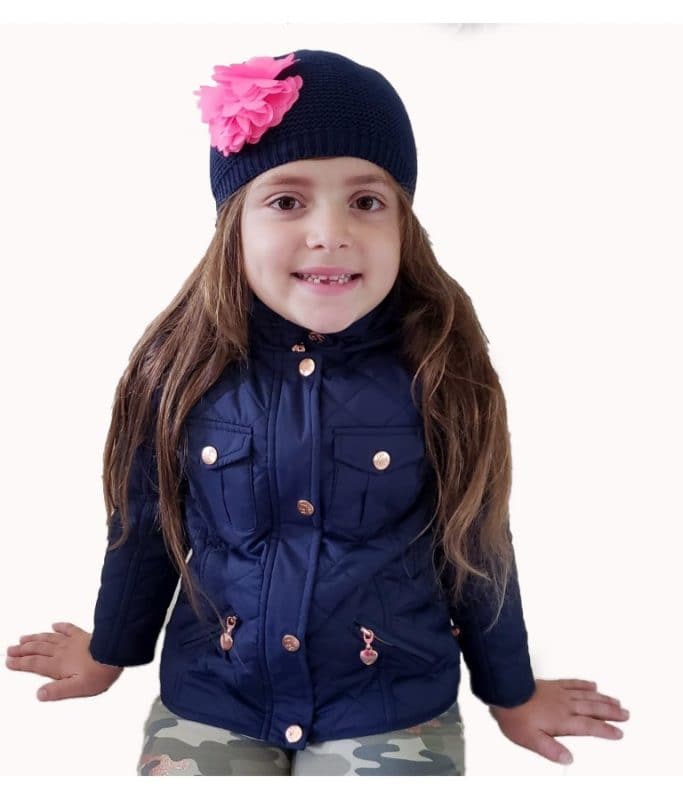 Navy knit beanie for girls with a decorative flower, perfect for stylish warmth.
