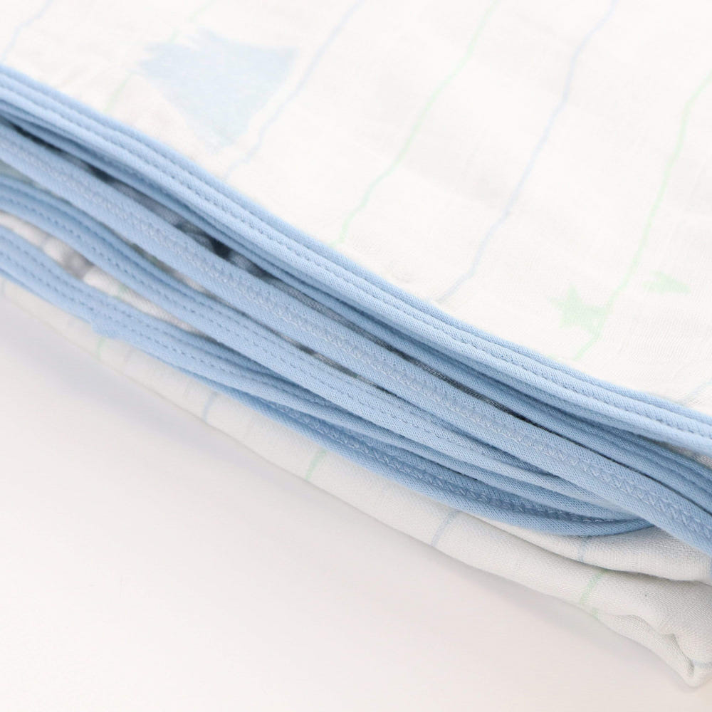 Mountain and Blue Oversized Bamboo Muslin Quilted Blanket for babies, soft and cozy for comfort and warmth.