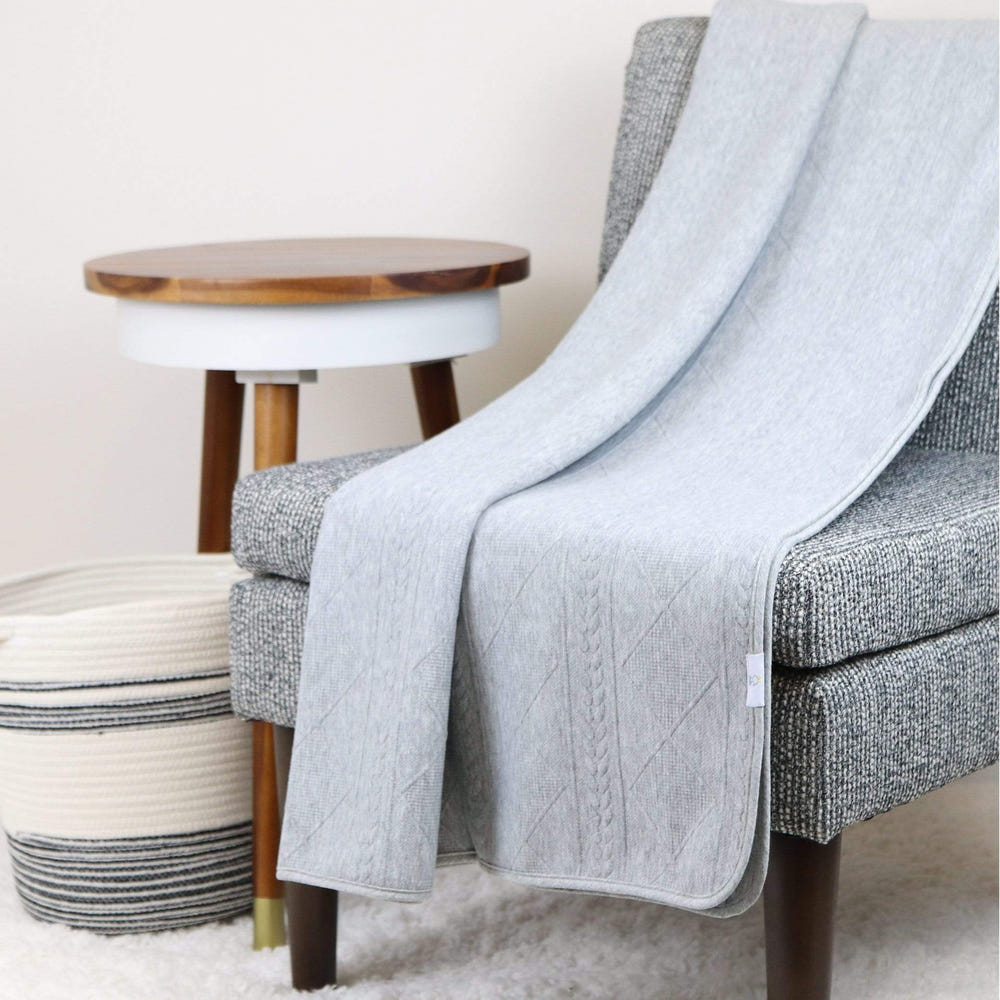 Gray 50" x 60" full-size knit throw blanket for babies, soft and cozy for comfort and warmth.