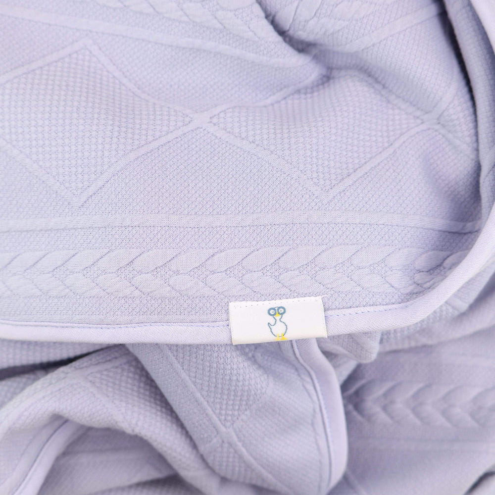 Soft lavender knit baby blanket, perfect for cozying up your little one.