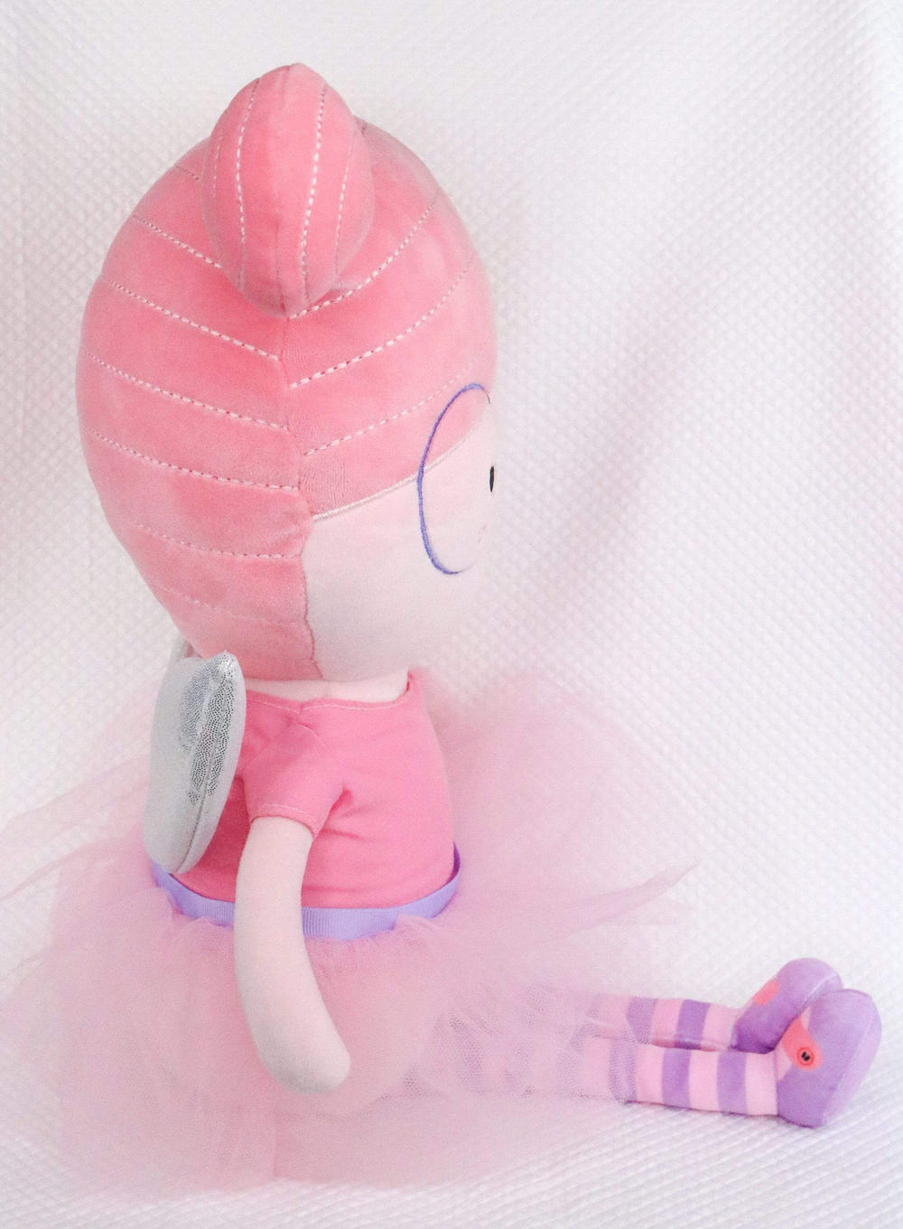 Meg Fairy Plush Doll with dress and wings, perfect for cuddles and imaginative play.