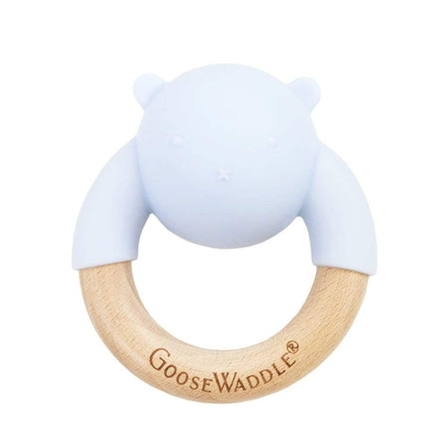 Wooden and silicone rattle teether in four colors, angled view showcasing its design and texture.