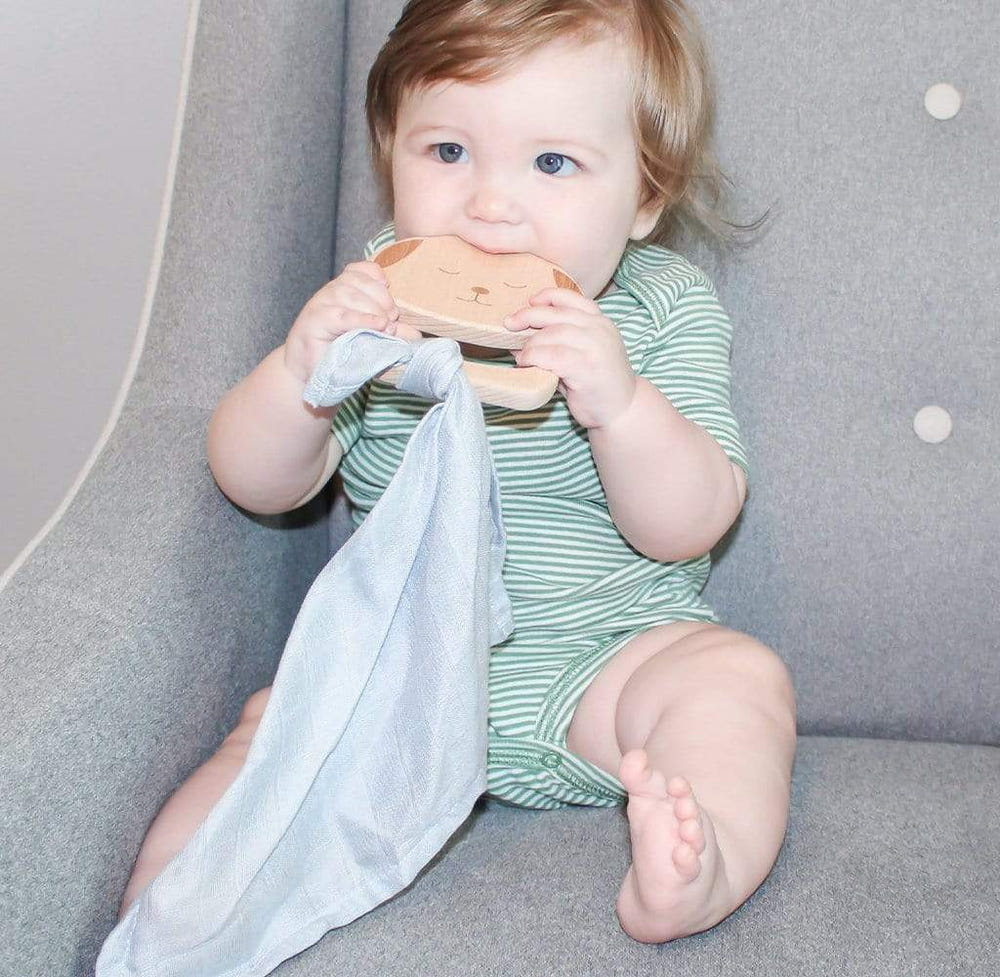 Puppy wooden teether and blue blankie for babies, perfect for soothing gums and comfort.