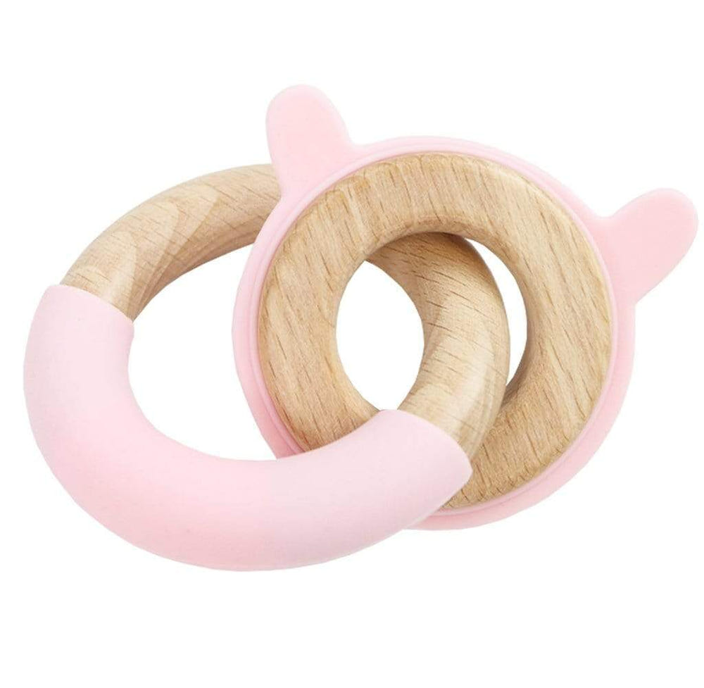Pink Bunny Silicone and Wood Double Teether for babies, safe and stylish for soothing teething discomfort.