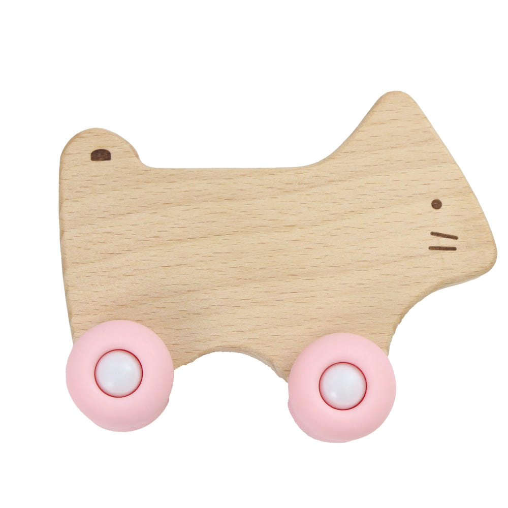 Pink kitten silicone and wood teether with wheels, perfect for soothing baby's gums and encouraging sensory play.
