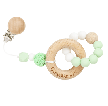 Mint wooden and silicone teether for babies, safe and soothing for teething relief.