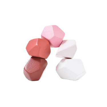 Blush set of 5 early learning and sensory play toys for babies, promoting exploration and development.
