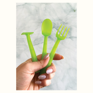 Colorful baby training utensils set for easy feeding, designed for little hands.