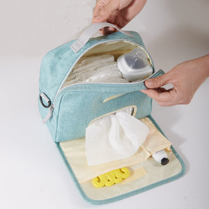 Stylish diaper changing bag at a 10-degree angle, perfect for parents on the go.