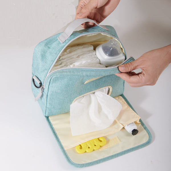 Stylish diaper changing bag at a 10-degree angle, perfect for parents on the go.