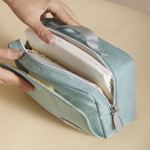 Stylish diaper changing bag at a 15-degree angle, perfect for on-the-go parents.