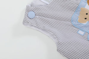 Grey gingham puppies in truck shortalls for babies, angle 3 view showcasing adorable design and comfort.
