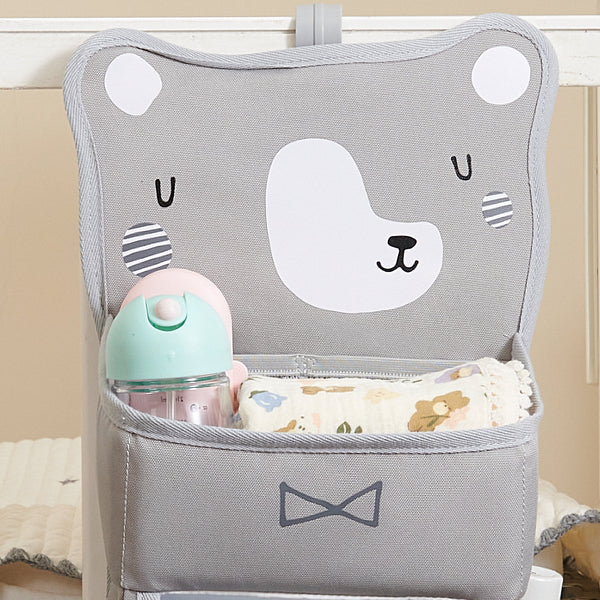 Cozy Buddy Crib Organizer in angle view, perfect for keeping baby essentials tidy and accessible in the nursery.