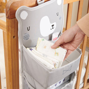 Cozy Buddy Crib Organizer in angle view, perfect for keeping baby essentials tidy and accessible in the nursery.