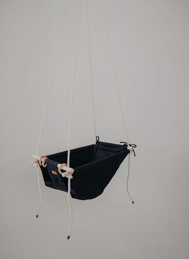 "Grow With Me Peppercorn swing for babies, designed for comfort and safety, perfect for soothing little ones."