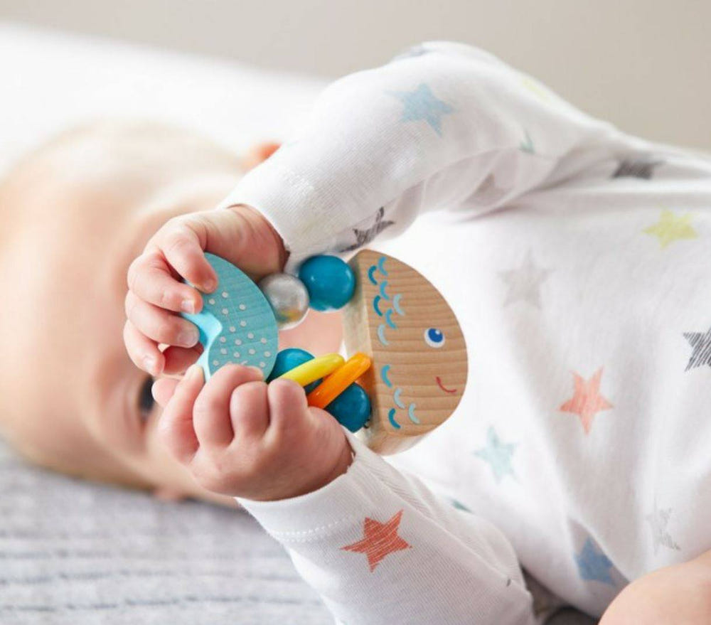 Rattlefish Wooden Baby Rattle - eco-friendly, colorful design for sensory play and development.