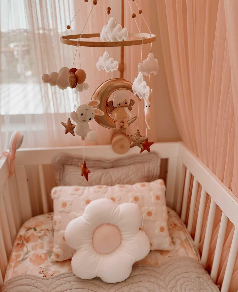 Handmade baby mobile "Dream" for imaginative play, featuring whimsical designs and soothing colors for nursery decor.