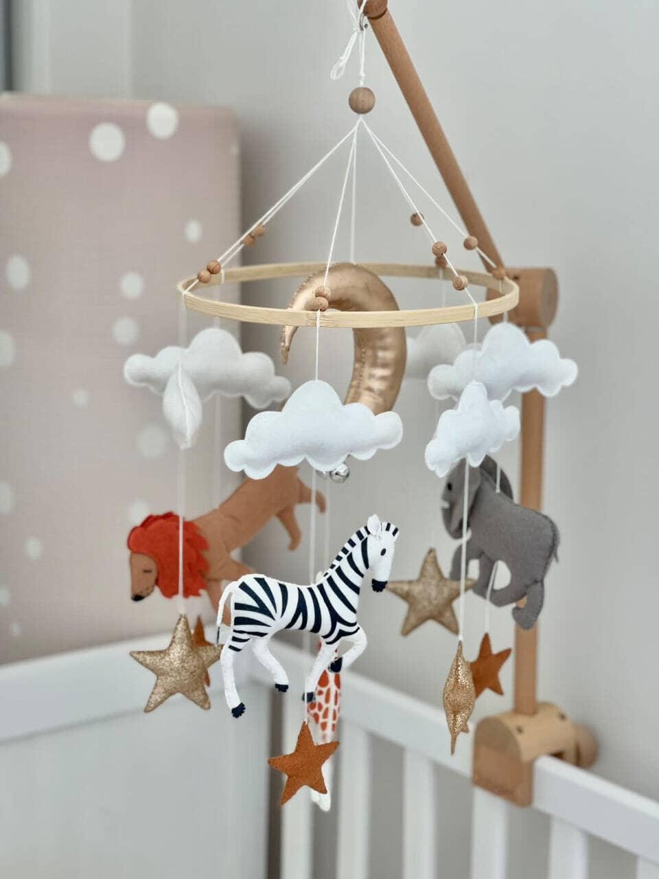 Handmade Safari Baby Mobile - Adorable décor accessory for nursery, featuring charming animal designs.