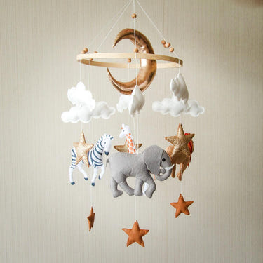 Handmade Safari Baby Mobile - Adorable décor accessory for nursery, featuring charming animal designs.