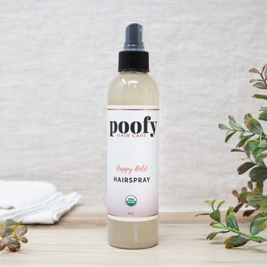 Happy Hold Organic Hair Spray for babies, gentle formula for soft, manageable hair. Safe and effective styling solution.