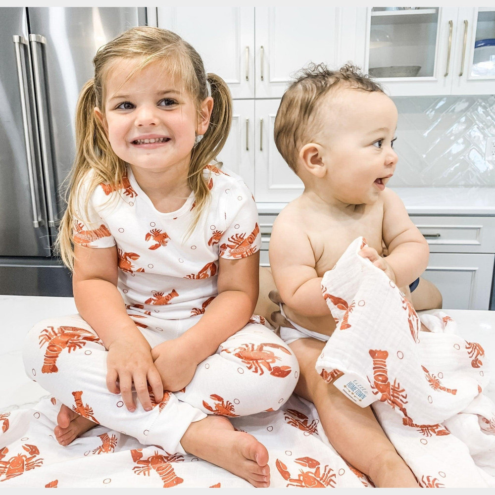 "Adorable Heads or Tails Lobster Crawfish Pajamas for babies, perfect for cozy sleep and playful adventures."