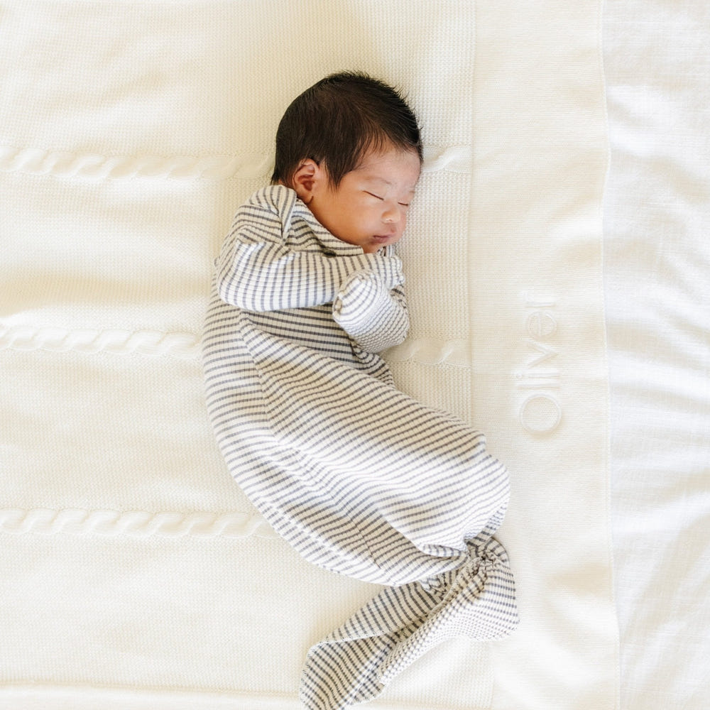 Heirloom cotton knit receiving blankets for babies, soft and cozy swaddles in a stylish design.