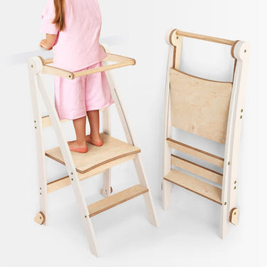 Multi-functional foldable step stool for kids, ideal for potty training and reaching high places.