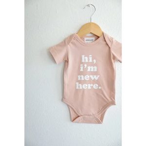 Hi, I'm New Here in Rose Organic Cotton Baby Onesie