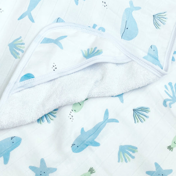 Hooded towel for babies in Cookie Craze design, angled view showcasing softness and fun pattern.