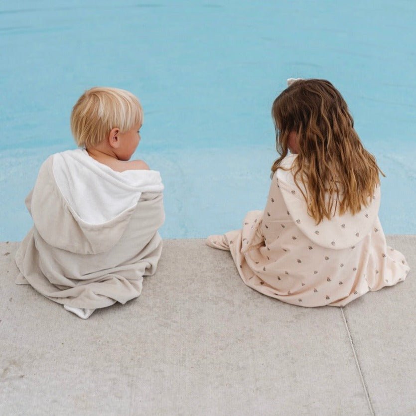 Soft and cozy hooded towels for babies, perfect for bath time and keeping little ones warm and dry.