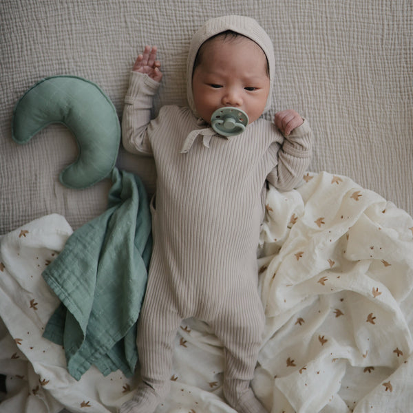 Soft Moon Lovey Blanket for babies, featuring a cozy design and soothing colors, perfect for comfort and security.