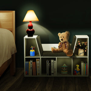 6-cubby kid storage bookcase with cushioned reading nook, perfect for organizing toys and books in a child's room.