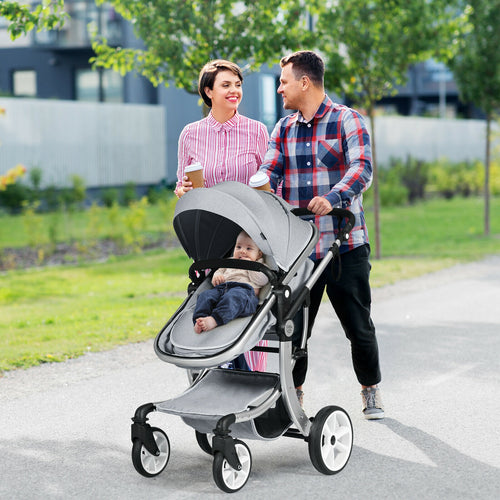 Folding aluminum infant stroller with diaper bag, reversible design, shown from angle 9. Perfect for travel and convenience.