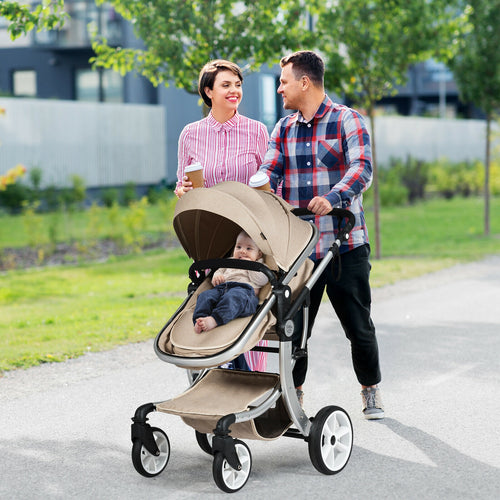Folding aluminum infant stroller with reversible seat and diaper bag, perfect for travel and convenience.