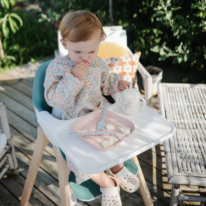 Square dinnerware plates for babies, angled view showcasing vibrant colors and safe, durable design.