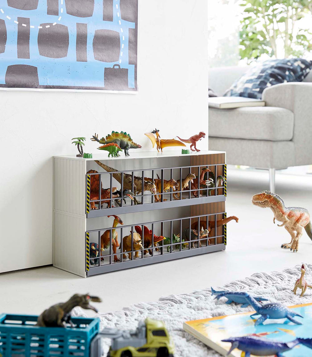 Clear toy display case for organized storage of baby toys, showcasing vibrant colors and easy access.