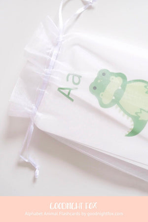 Colorful alphabet flashcards for babies, promoting learning through puzzles and creative activities.