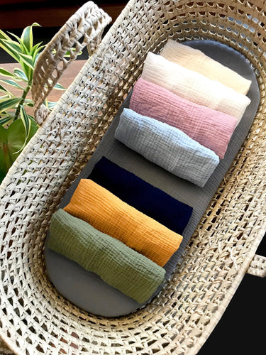 Organic cotton soft double gauze fitted sheet in various colors, custom made for a perfect baby crib fit.