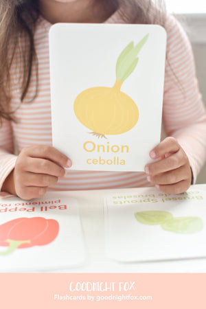 "Colorful vegetable flashcards for babies, enhancing learning and playtime in a stylish furniture setting."